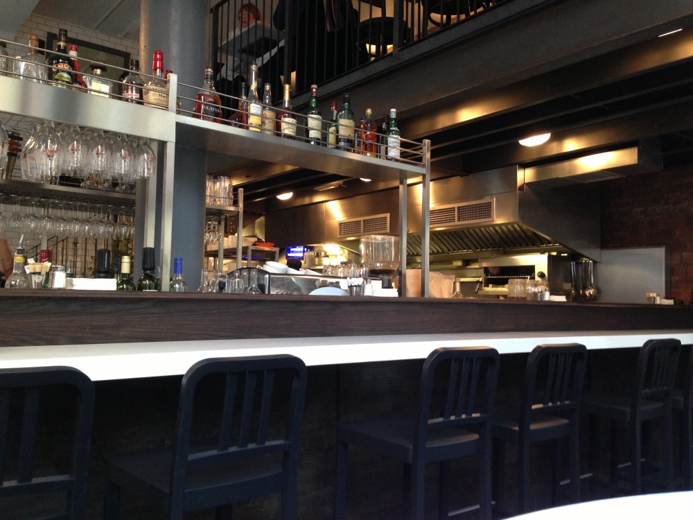 The open plan bar/kitchen