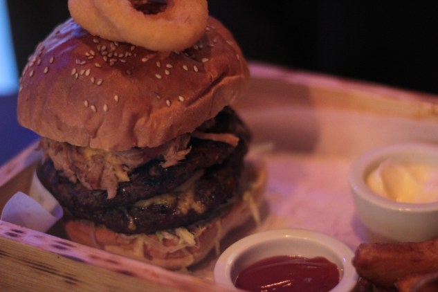 Double Pulled Pork Cheeseburger with added hot sauce.
