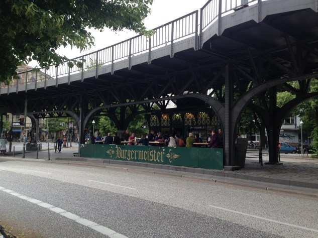 Tucked away underneath a train station bridge