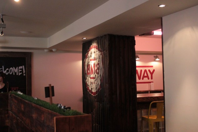 A combination of reclaimed timber and iron sheeting lines the interior of BMB