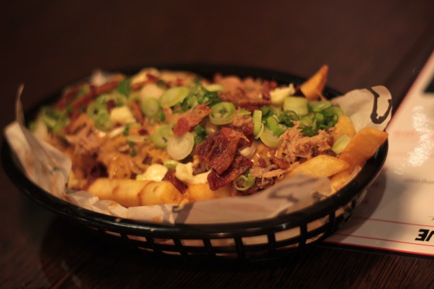 'Carolina' Poutine. Fries, cheese curds, gravy, pulled pork & bacon.