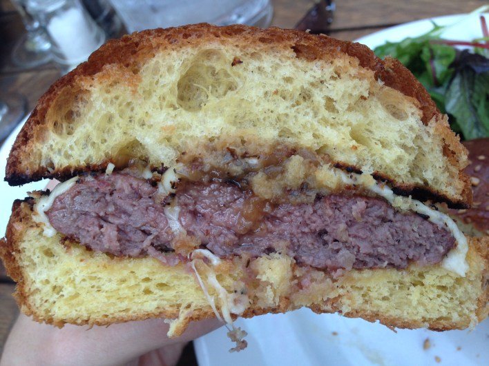 Topped with caramelised onions and swiss.